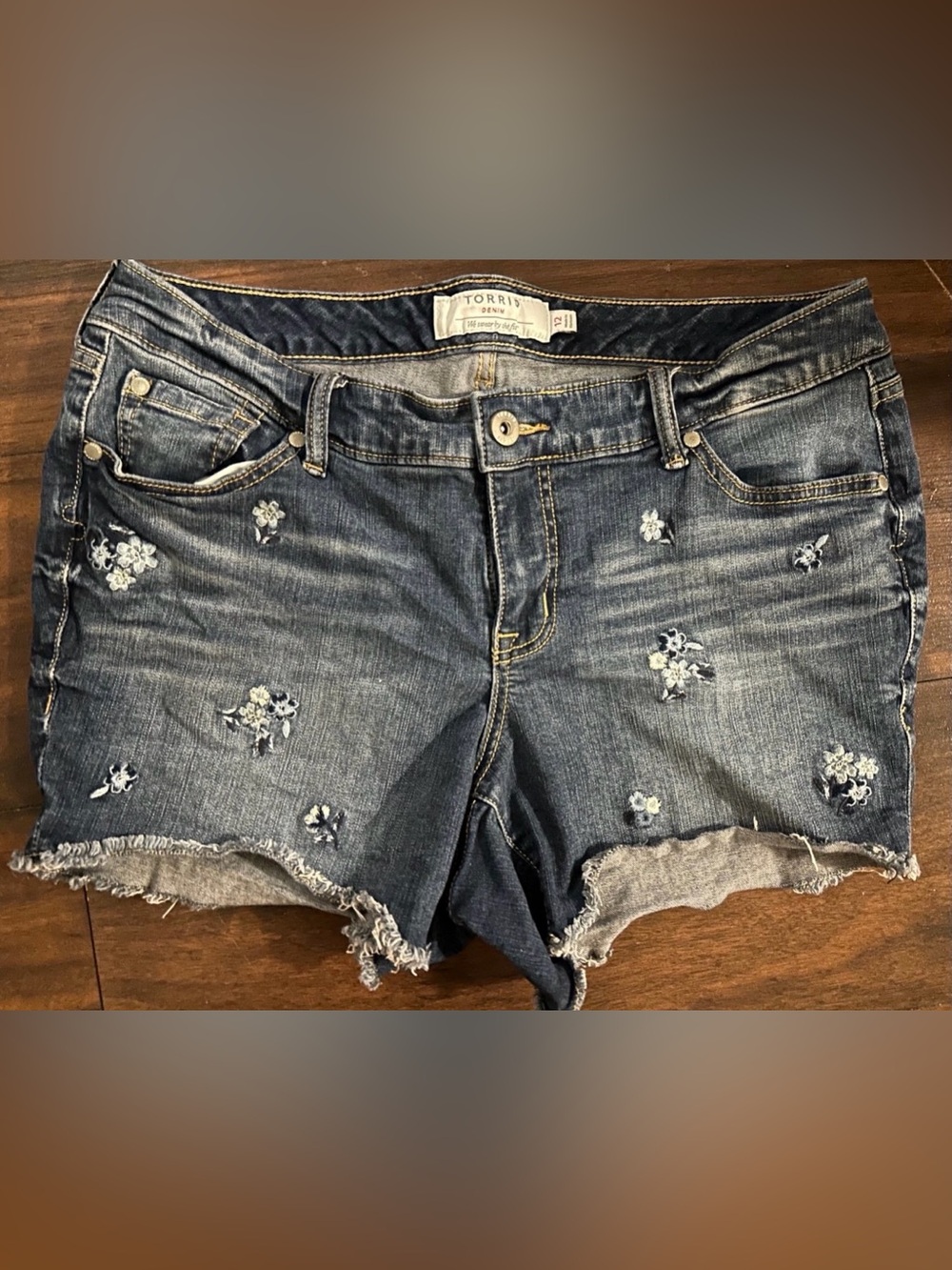 torrid dark blue floral embroidered cutoff denim shorts
